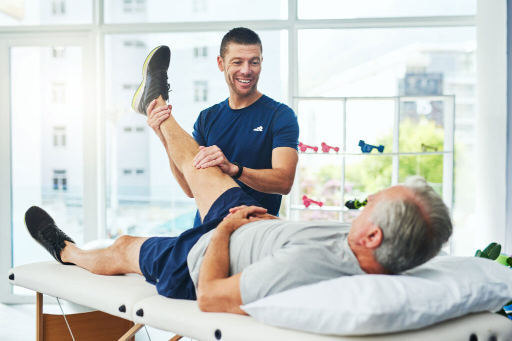 Physical Therapist working on a patient.
