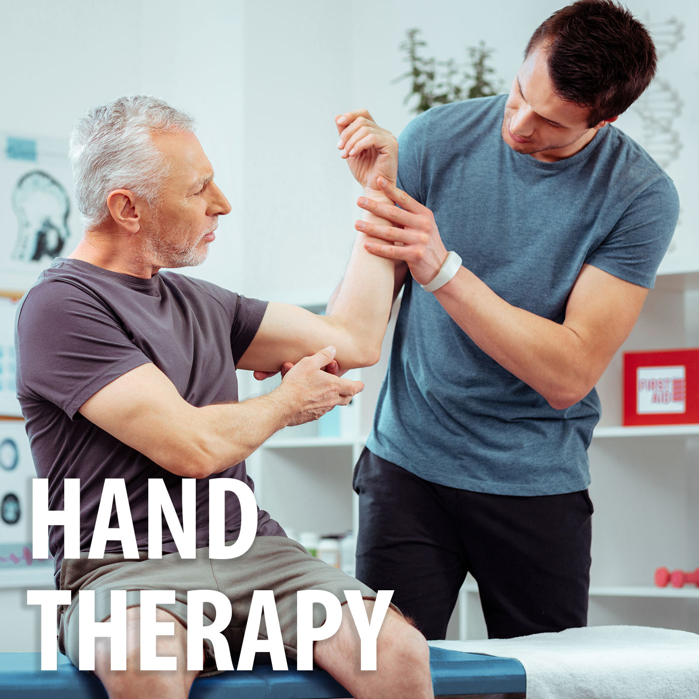 Patient receiving hand therapy from physical therapist