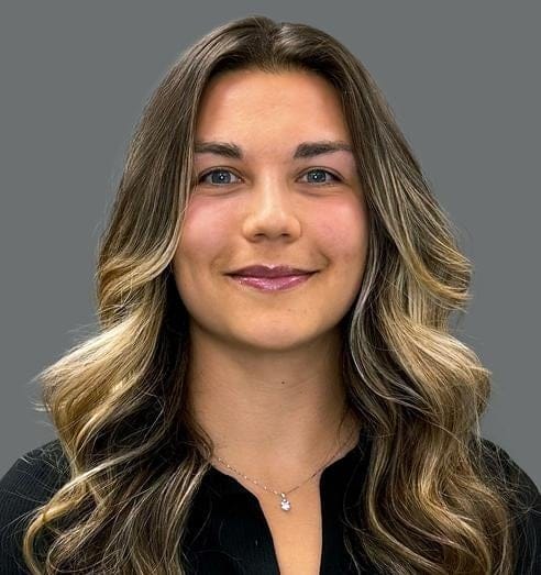 Headshot of Caitlin Von Vreckin