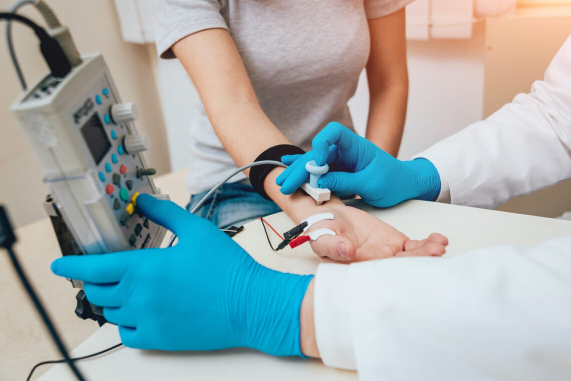 Patient nerves testing using electromyography. Medical examination. EMG